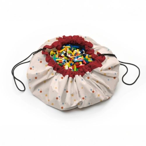 circus toy storage bag and playmat, closed bag filled with lego
