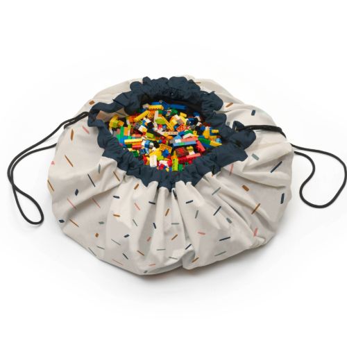 confetti toy storage bag and playmat, closed bag filled with lego