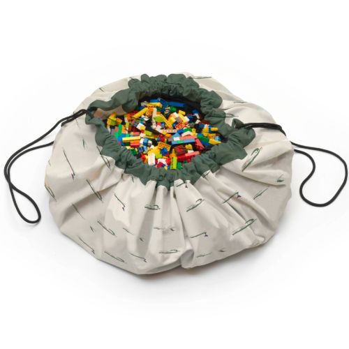 croco toy storage bag and playmat, closed bag filled with lego