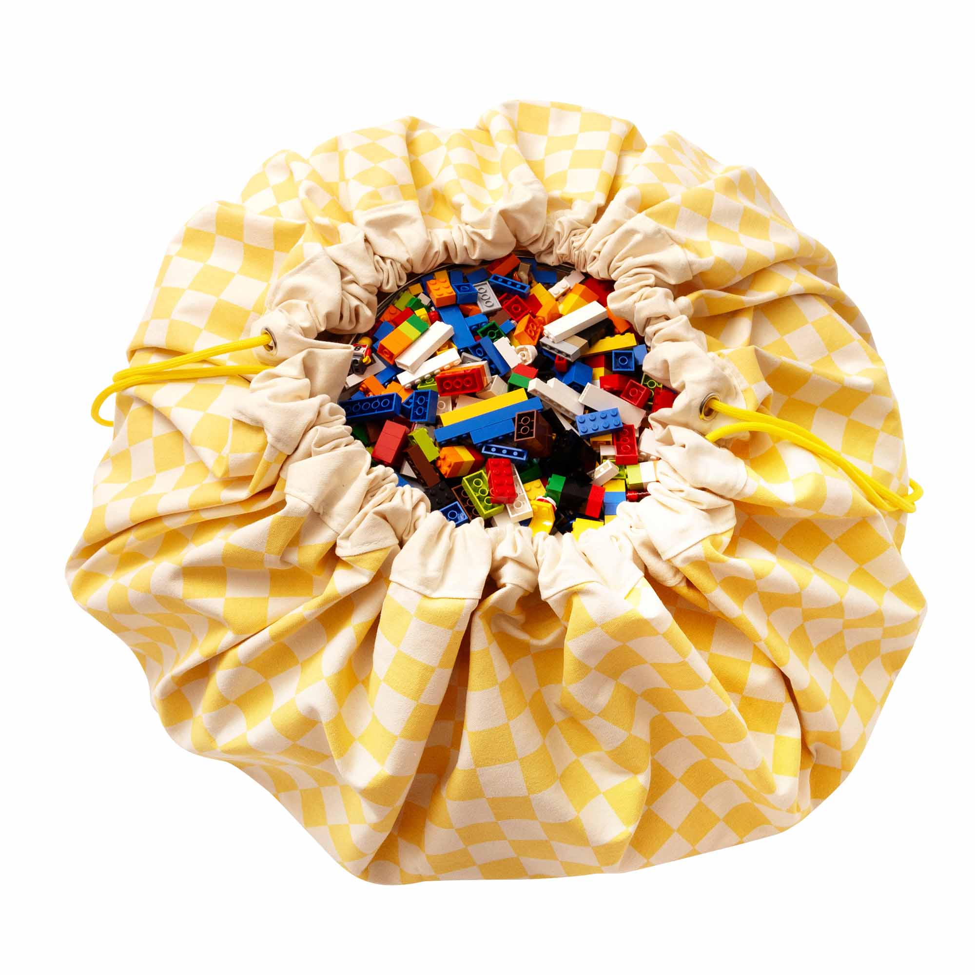 vichy yellow toy storage bag, closed, filled with lego