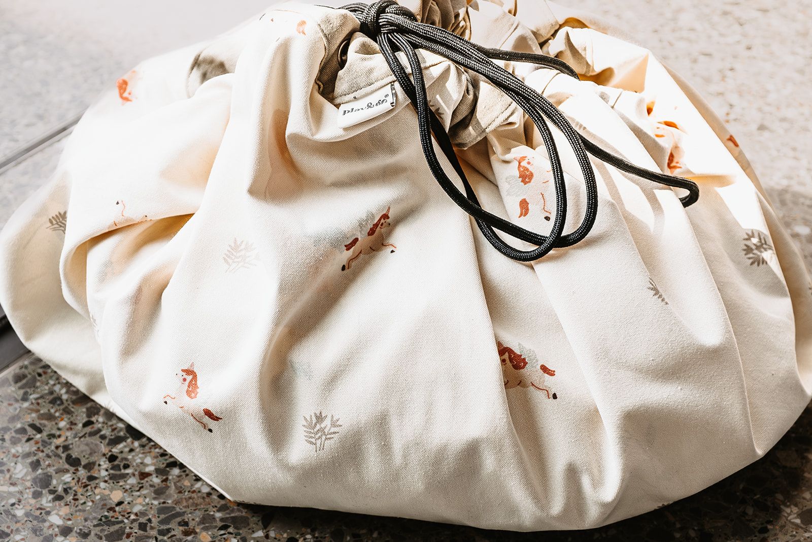 fairyworld toy storage bag and playmat, closed bag