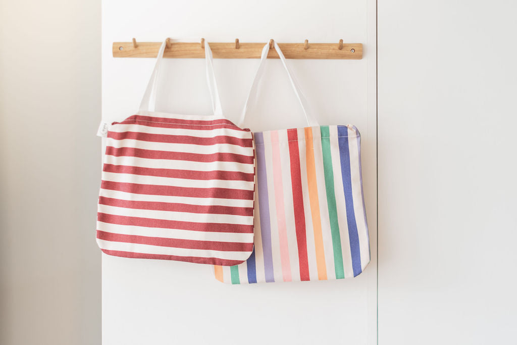 toto unicorn and toto bunny, hanging on the wall, transformed into bags