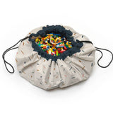 confetti toy storage bag and playmat, closed bag filled with lego