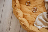 Bloom mustard organic babymat, detail picture of raised edges