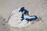 outdoor balloon storage bag and play mat, bag lying in the sand